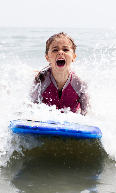 enfant surf dans les landes