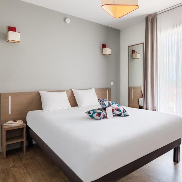 Chambre double de l'Appart'City Confort Perpignan Centre Gare dans les Pyrénées Orientales en Occitanie