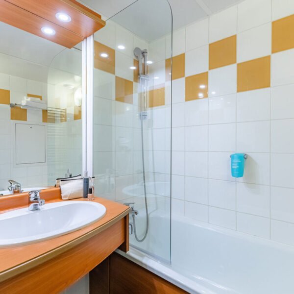 Salle de bain d'un appartement de l'Appart'City Confort Lyon Gerland dans le Rhône en Auvergne Rhône Alpes