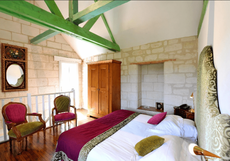 chambre de l'hôtel la demeure de la vignole